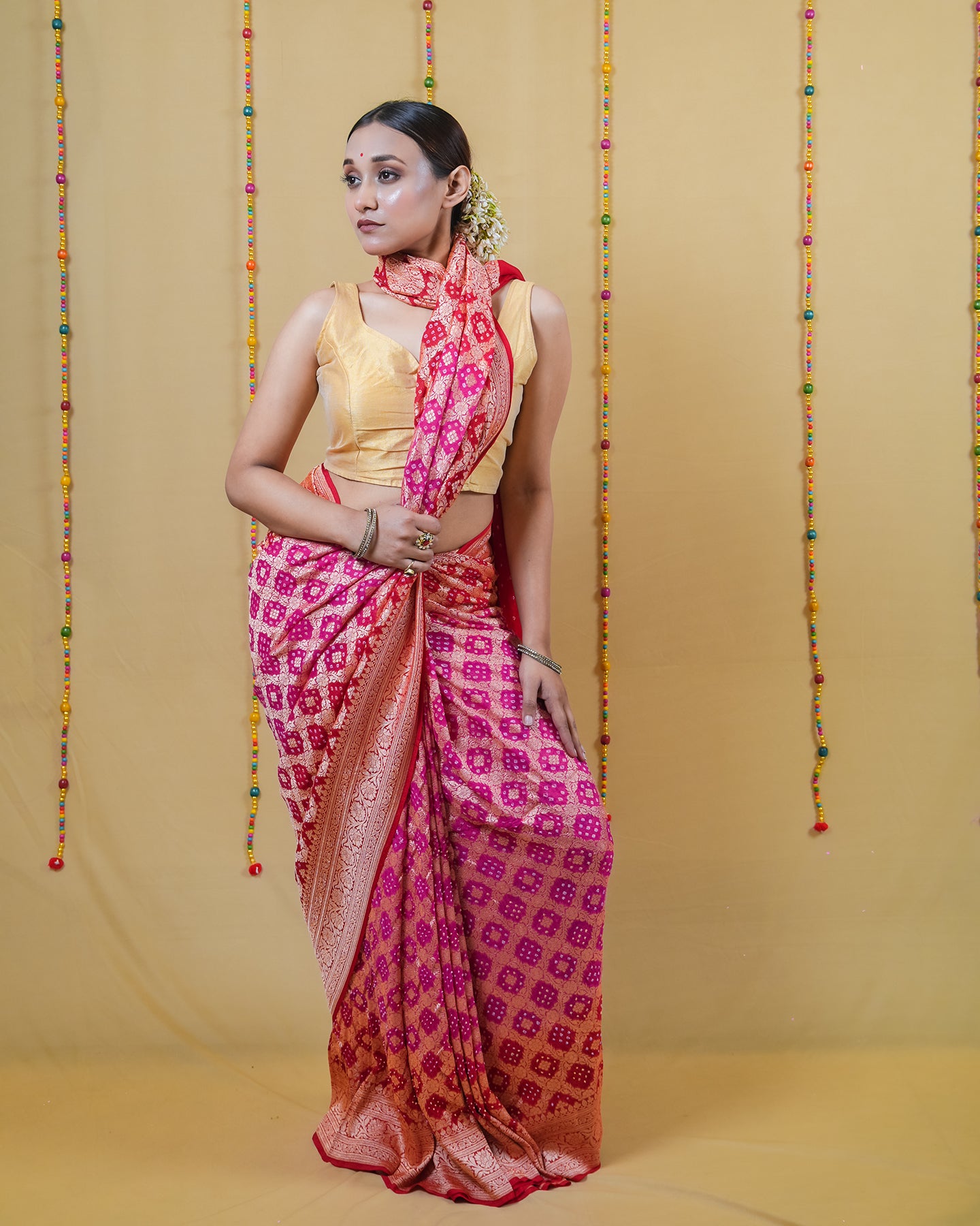 Rani Red Zari Woven Georgette Bandhani Silk Saree