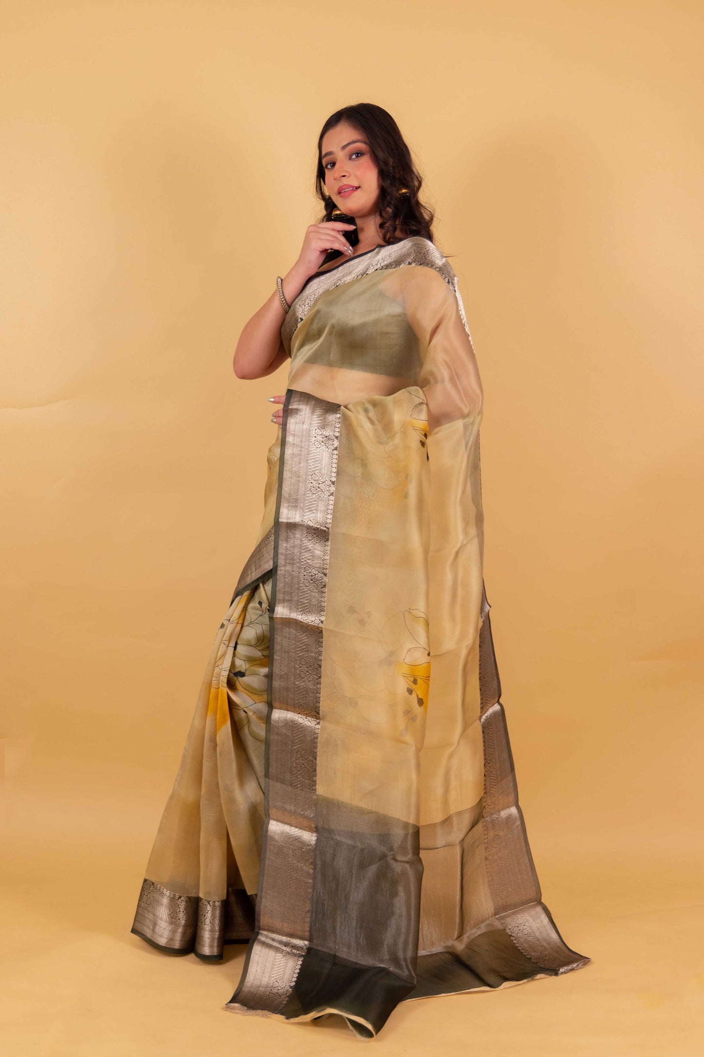 Beige and Green Floral Handprint Organza Silk Saree