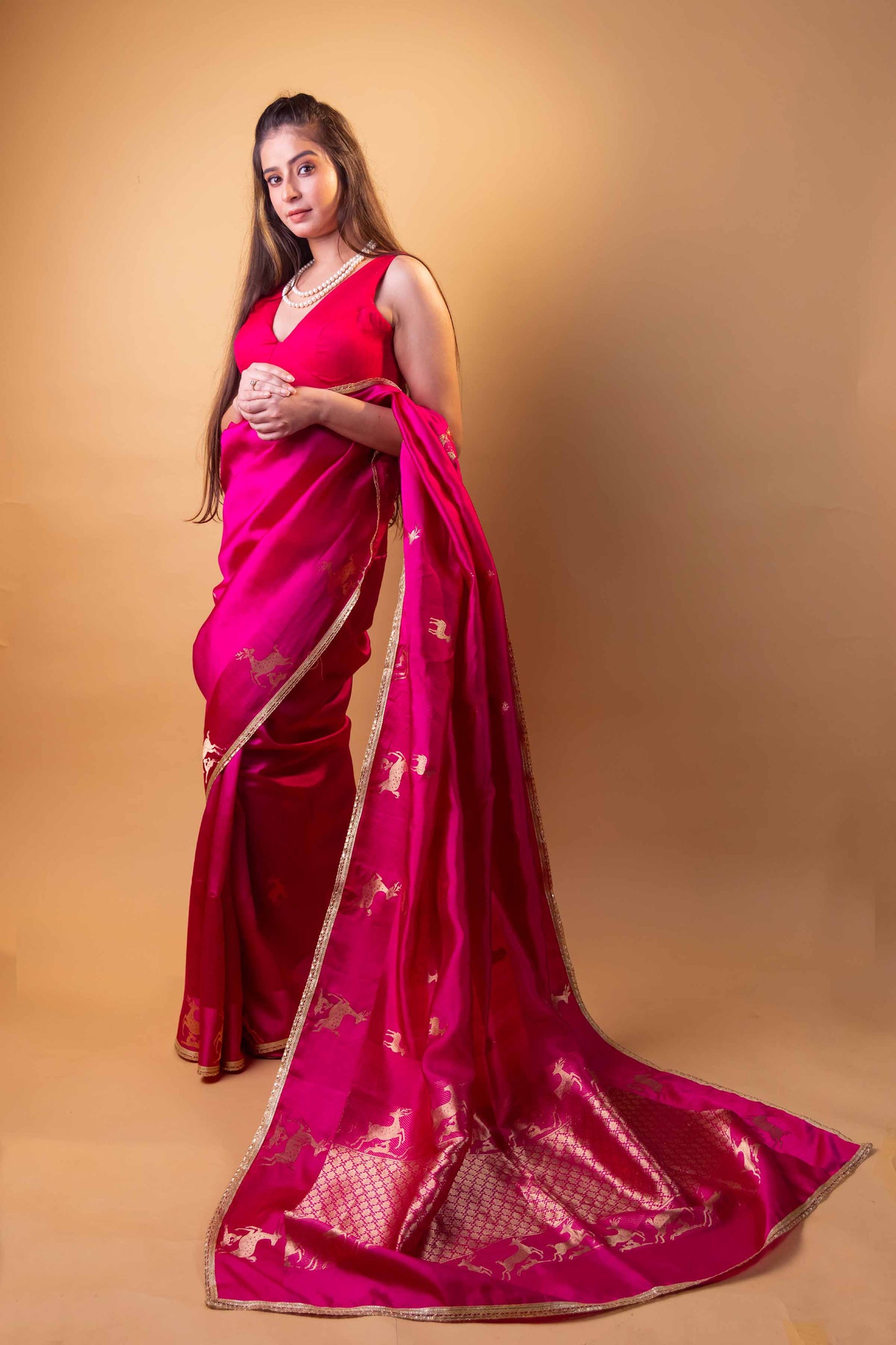 Rani Pink Deer Motif Raw Mango Silk Saree